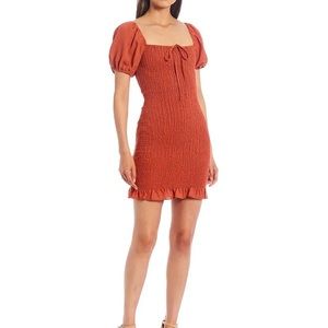 Gianni Bini
Alli Smocked Short Sleeve Tie Square Neck Ruffle Hem Dress